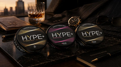 HYPE nicotine pouches UK premium collection featuring Bubblegum 80mg, Extreme Gold 24mg and Cappuccino 80mg in luxury setting