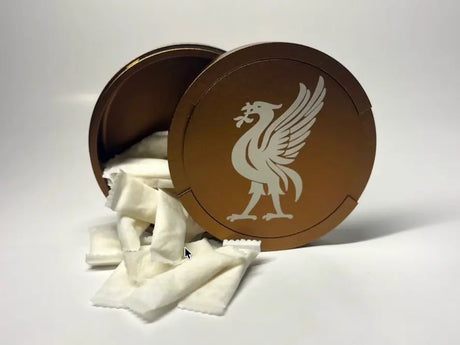 metal can filled with nicotine pouches on a clean surface UK